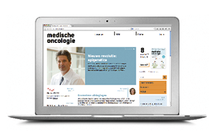 Foto van de homepage van MO Online op een tablet